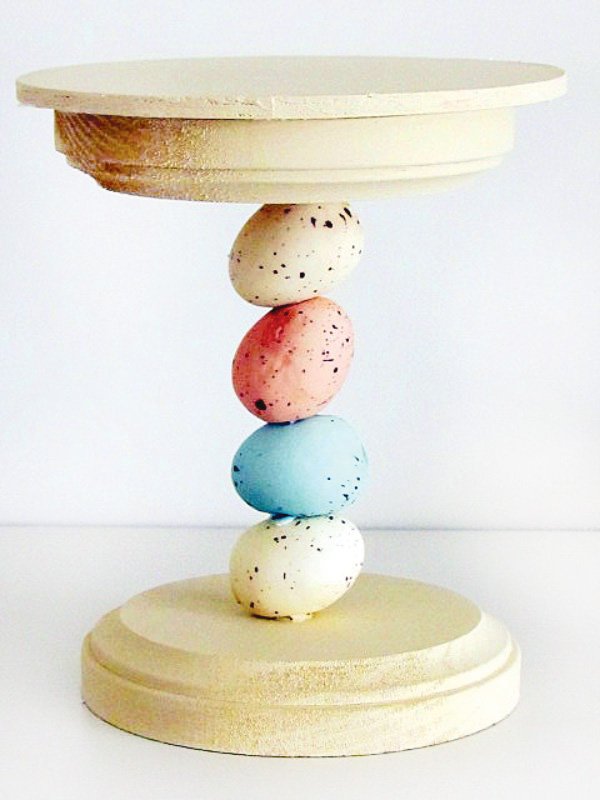 mini easter dessert stand with eggs in pink white and blue