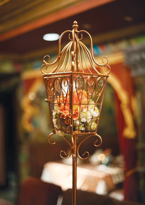 tea-baby-shower-high-centerpiece eclectic teacup baby shower birdcage centerpiece