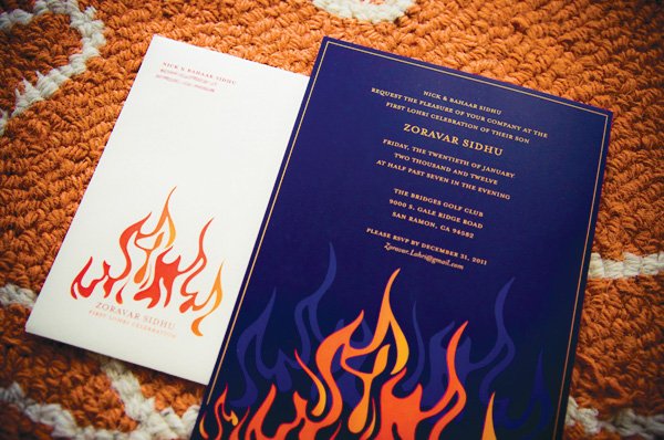first birthday invitation with deep blue and orange flames