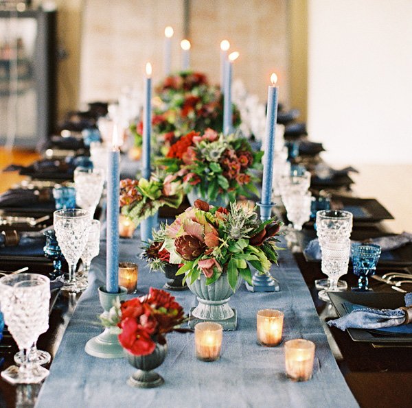 tablescape with blue candlesticks and asymmetrical styling