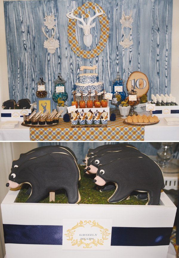 modern nature inspired party dessert table with grizzly bear cookies