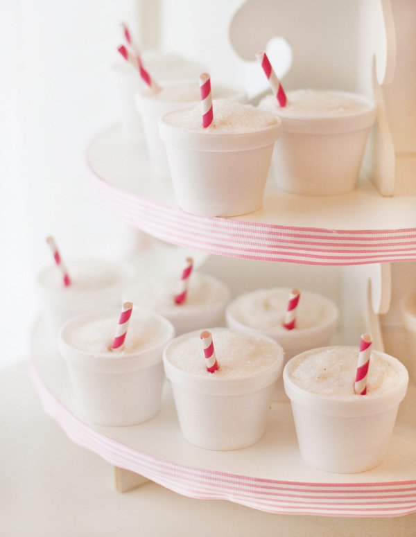 snow cone cupcakes with pink stripe straws