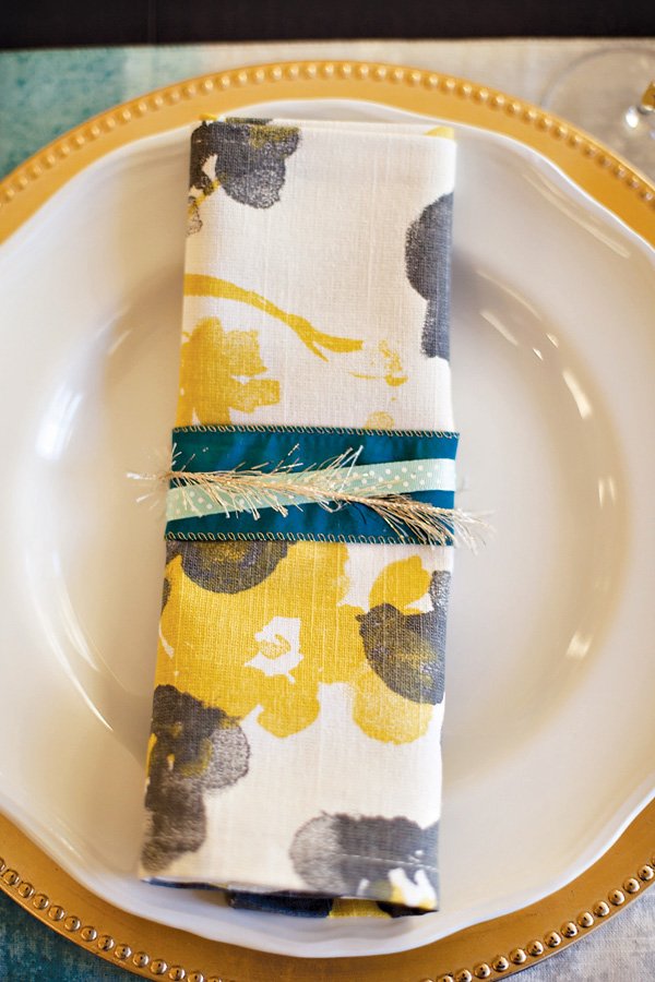 blue yellow and gold place setting