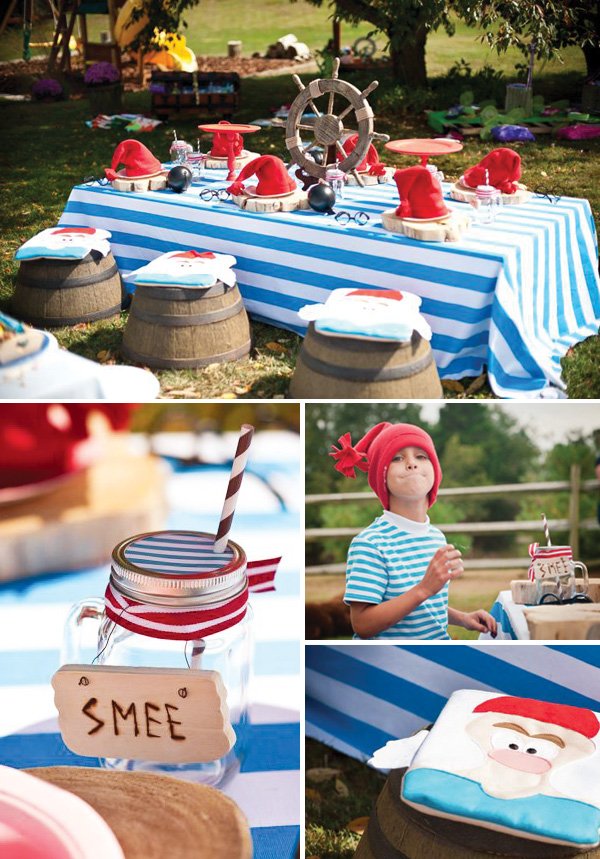 smee table, cookies and costume for a peter pan themed birthday party