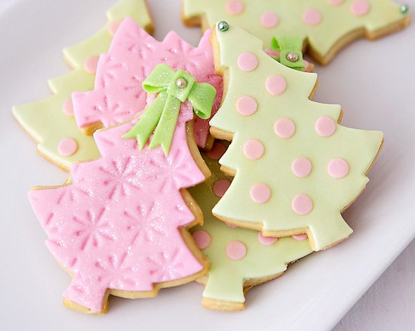 Mint and pink polka dotted and snowflake stamped christmas tree cookies
