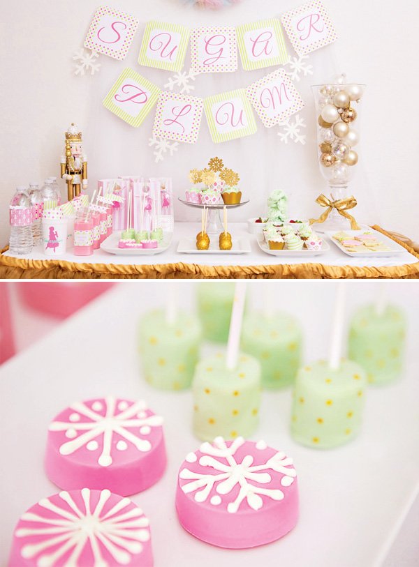 Sugar plum fairy holiday dessert table with marshmallow pops and snowflake cookies