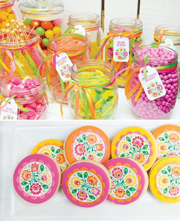 brightly colored candy and flower printed or decorated sugar cookies