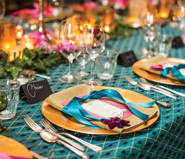 teal and gold formal place setting and tablescape