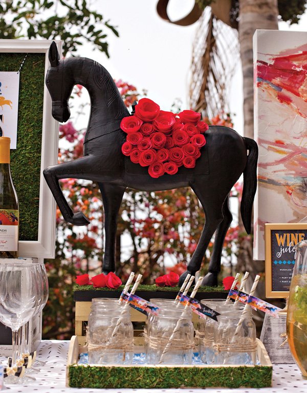 horse centerpiece with garland of crepe paper roses