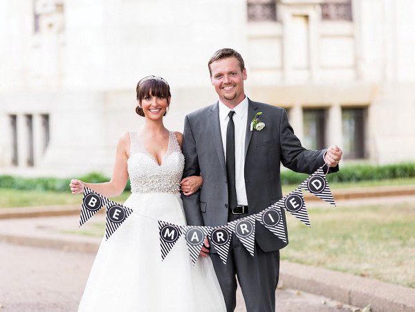 striped 'be married' banner for the bride and groom