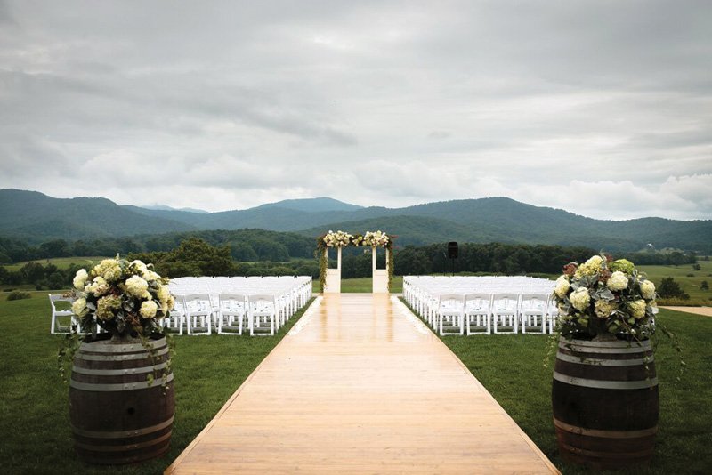 wine barrel wedding aisle